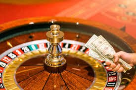 Live-dealer tables streamed from our studios Live dealer table with professional croupier dealing cards in a multi-camera studio